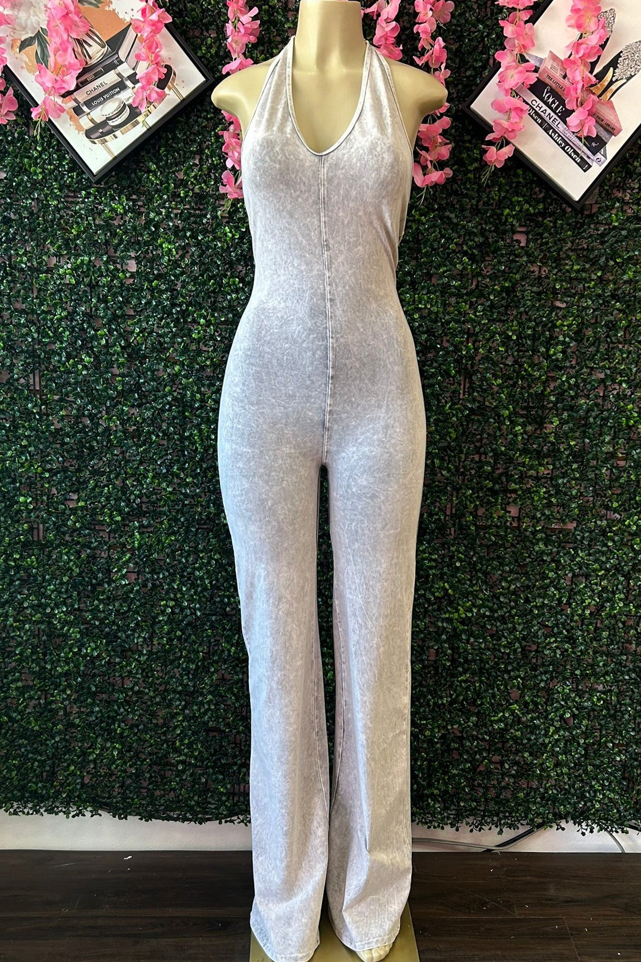 HALTER FLARE JUMPSUIT WITH OPEN BACK AND RUCHED DETAIL